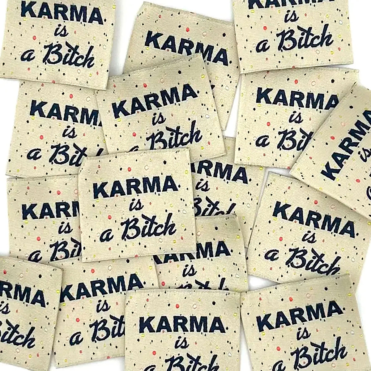 Etiquette à coudre de Home Couture, modèle Karma is a bitch (crème / multico - noir)