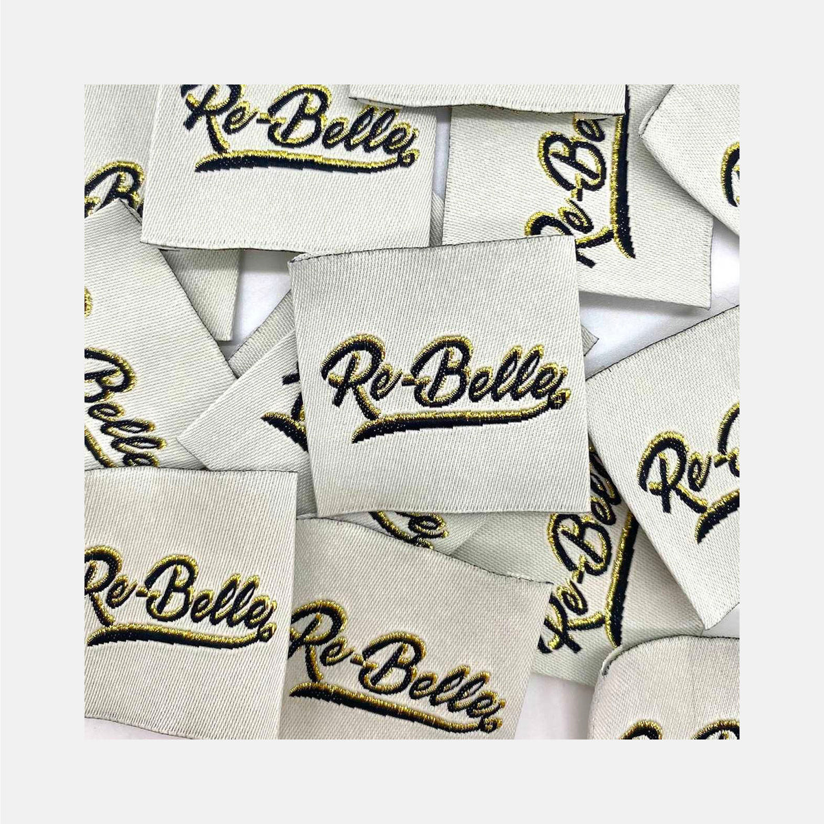 Etiquette à coudre de Home Couture, modèle Re-belle (écru - noir / lurex)