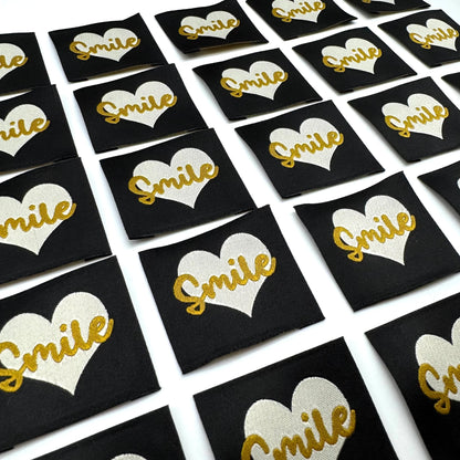 Etiquette à coudre de Home Couture, modèle Smile (noir / blanc - lurex)