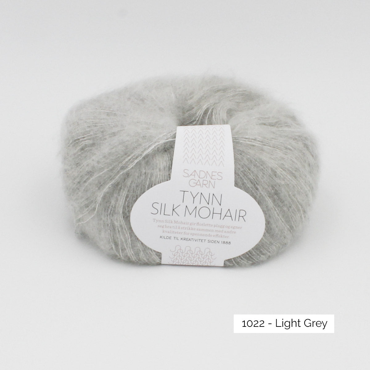 Pelote de Tynn Silk Mohair de Sandnes Garn, coloris 1022 Light Grey